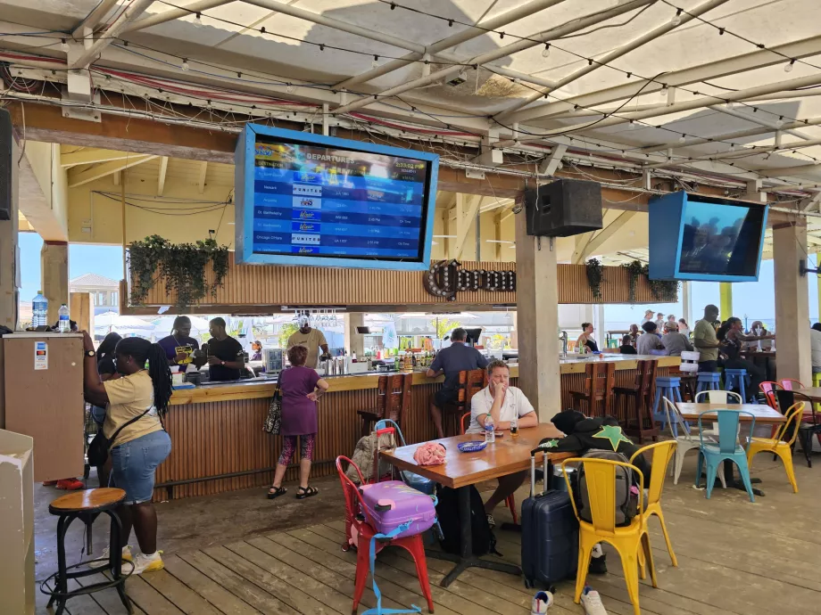 Departure and arrival board in Sunset Bar